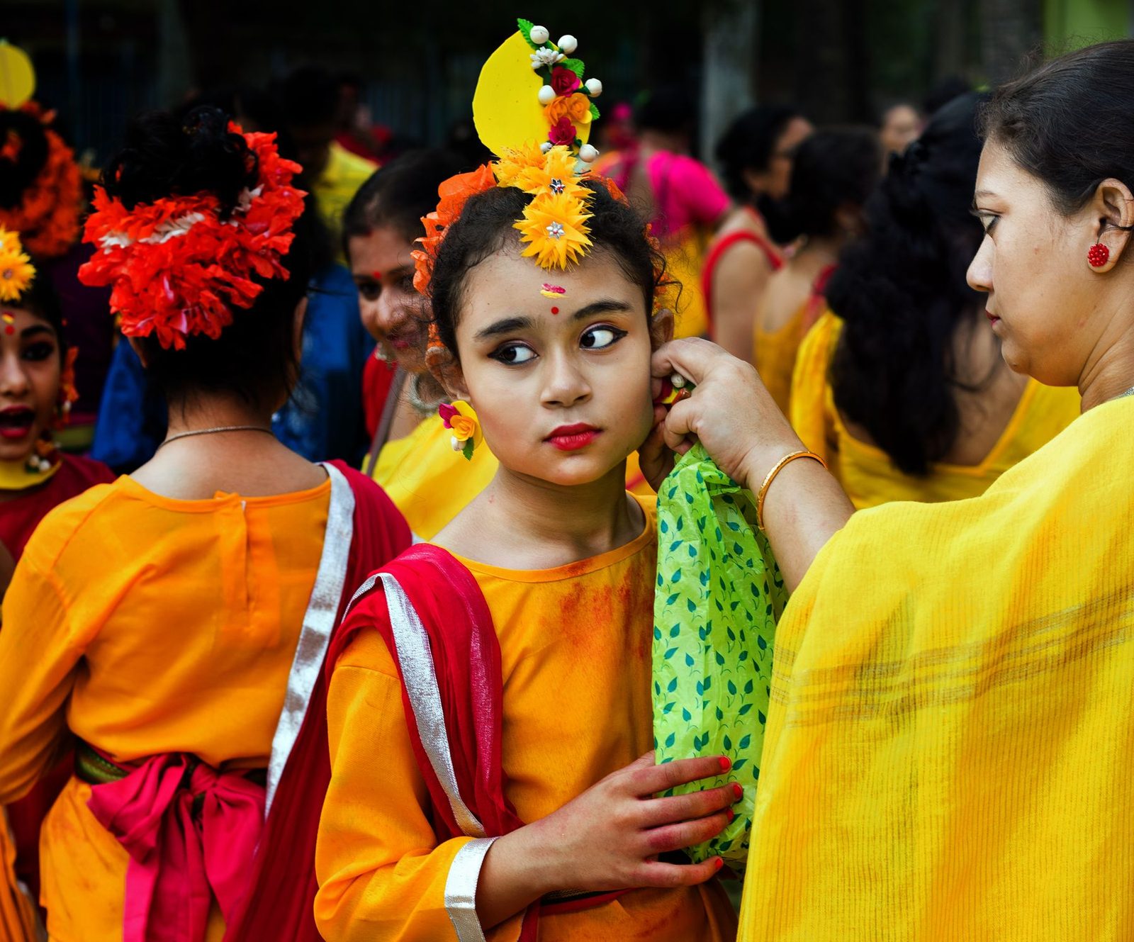 Guests in yellow at a haldi ceremony